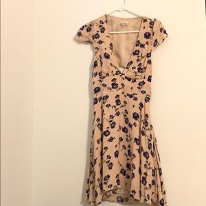 Dress , open back, deep V neck